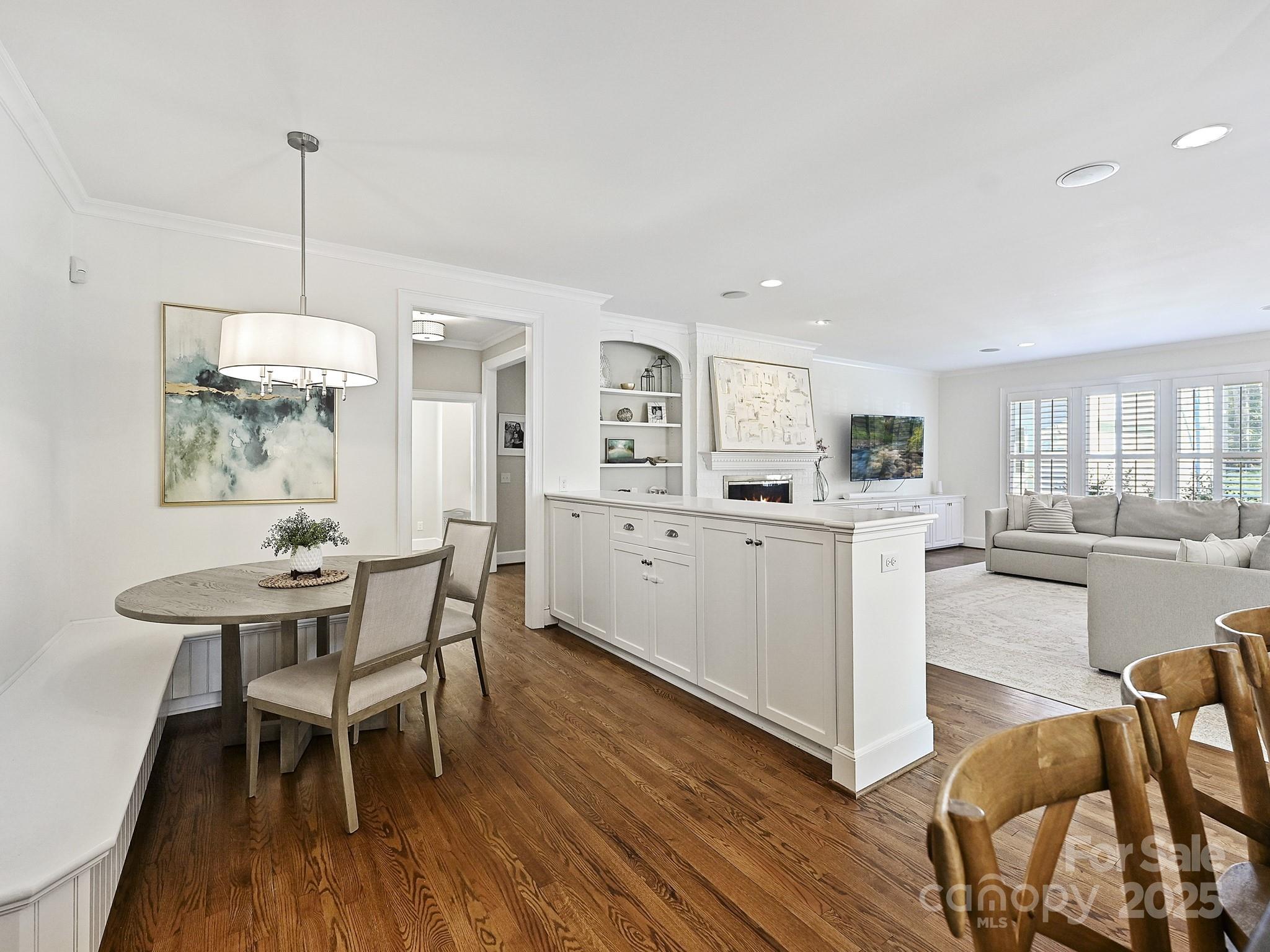 3915 Ayscough Road Charlotte, NC 28211 - Photo 18 of 45 a view of a dining room with furniture window and wooden floor