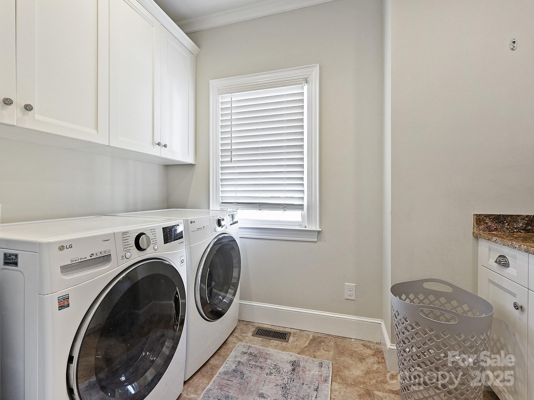 3915 Ayscough Road Charlotte, NC 28211 - Photo 26 of 45 a utility room with dryer and washer