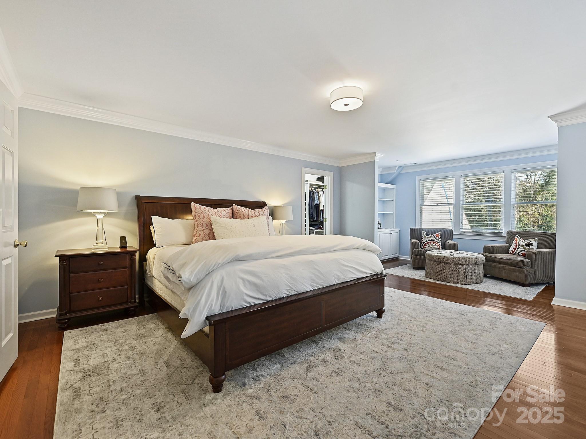 3915 Ayscough Road Charlotte, NC 28211 - Photo 27 of 45 a bedroom with a large bed and a couch