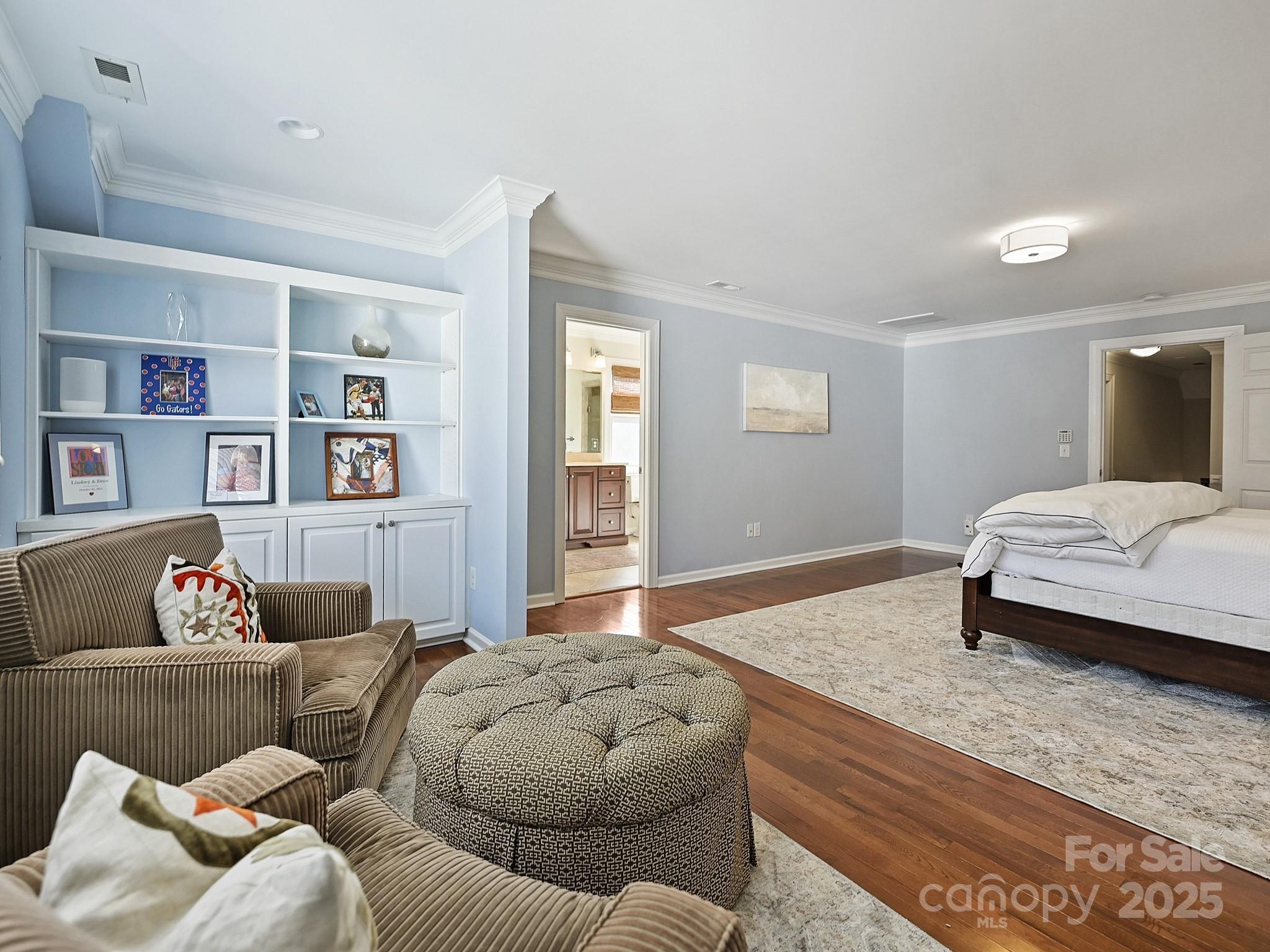 3915 Ayscough Road Charlotte, NC 28211 - Photo 28 of 45 a bedroom with a bed and couch