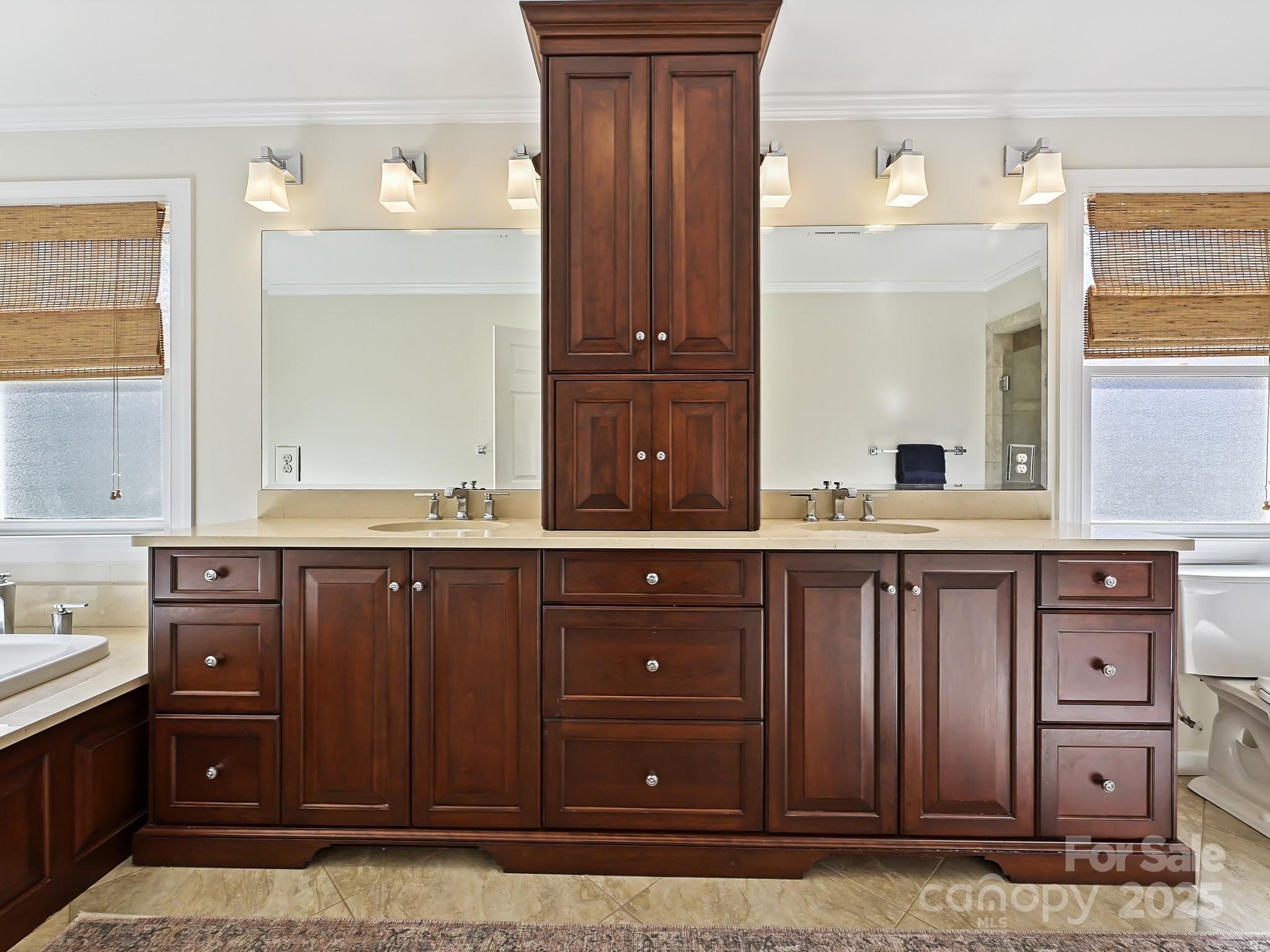 3915 Ayscough Road Charlotte, NC 28211 - Photo 29 of 45 a bathroom with a sink and a mirror