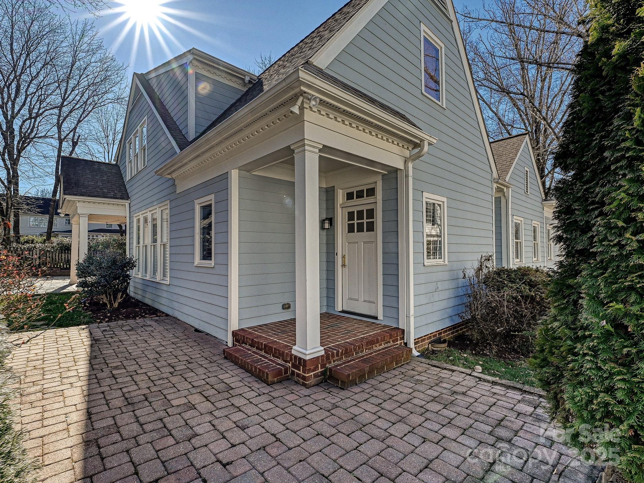 3915 Ayscough Road Charlotte, NC 28211 - Photo 38 of 45 a front view of a house with a yard
