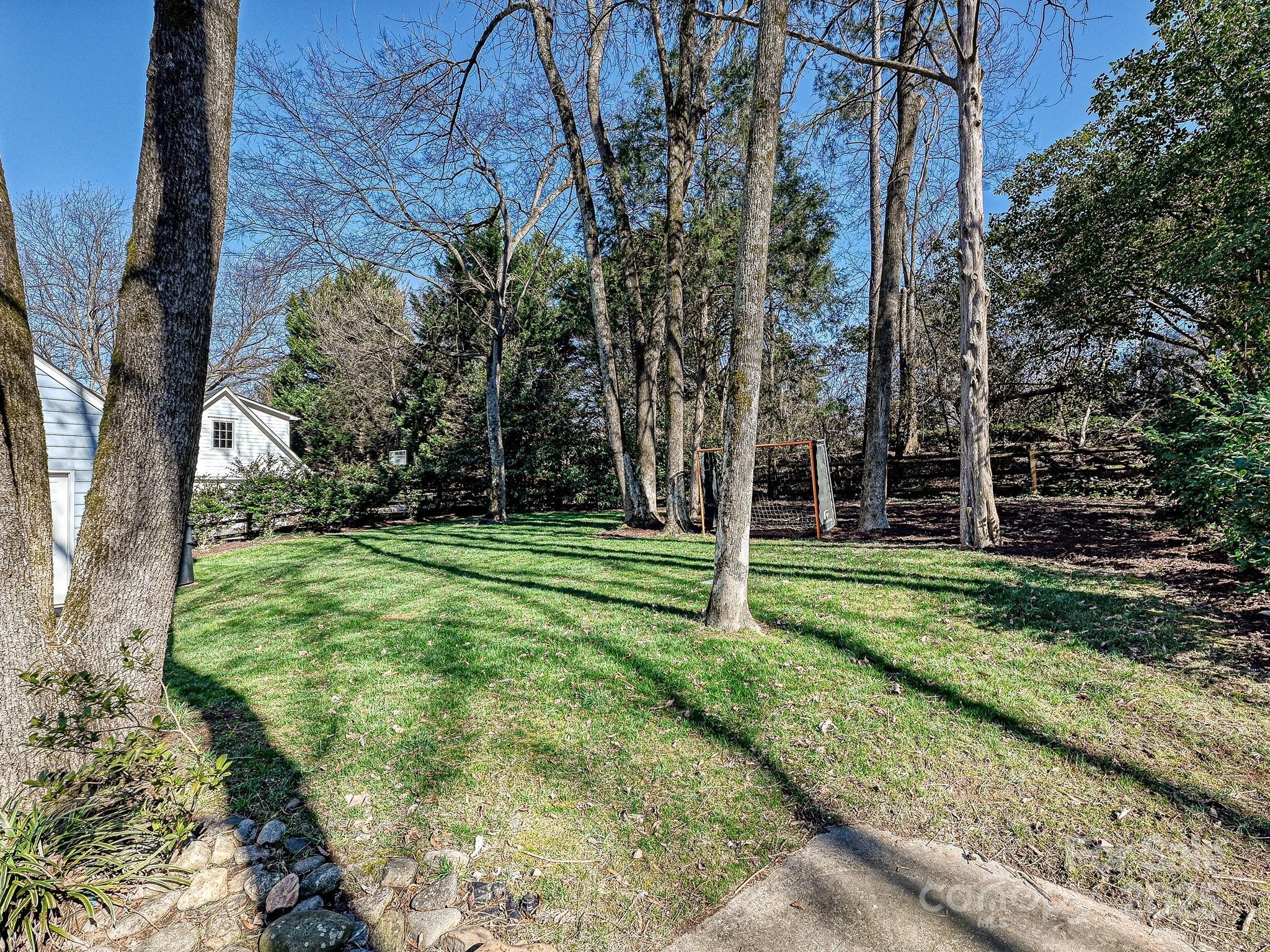 3915 Ayscough Road Charlotte, NC 28211 - Photo 40 of 45 a view of a park with large trees