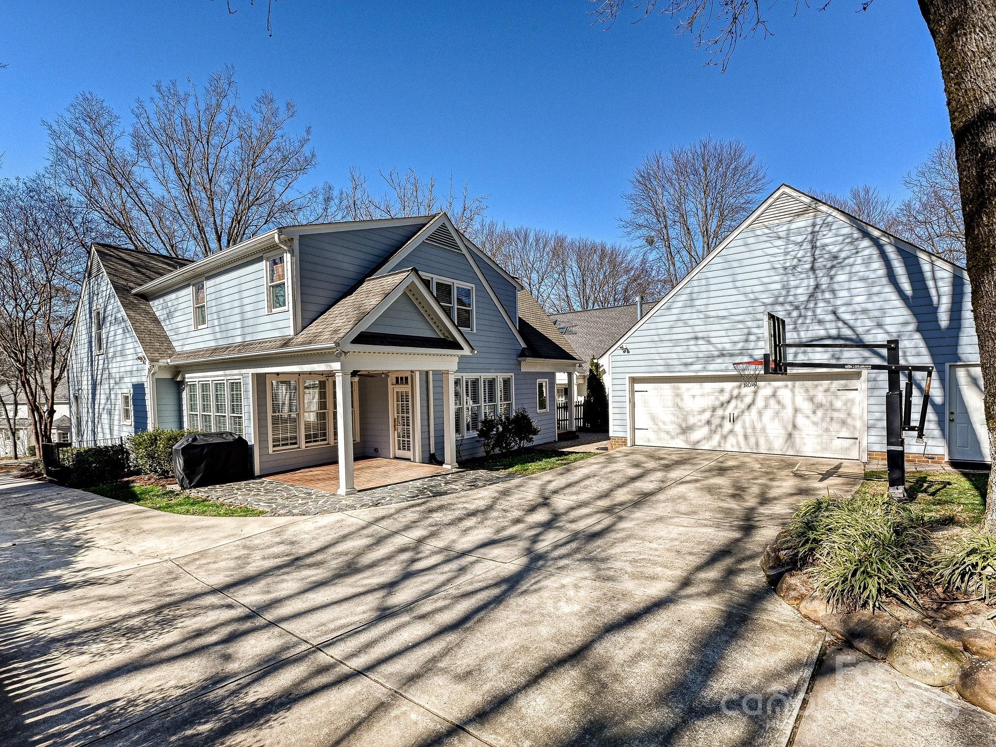 3915 Ayscough Road Charlotte, NC 28211 - Photo 41 of 45 a front view of a house with a yard