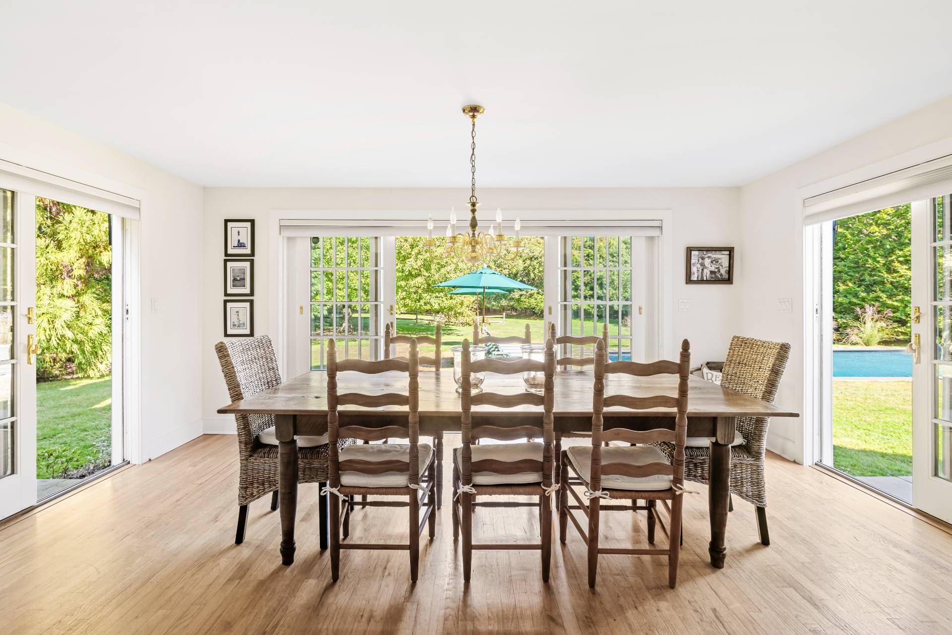 10 Aelfie's Way Bridgehampton, NY 11932 - Photo 11 of 23 a view of a dining room with furniture window and wooden floor