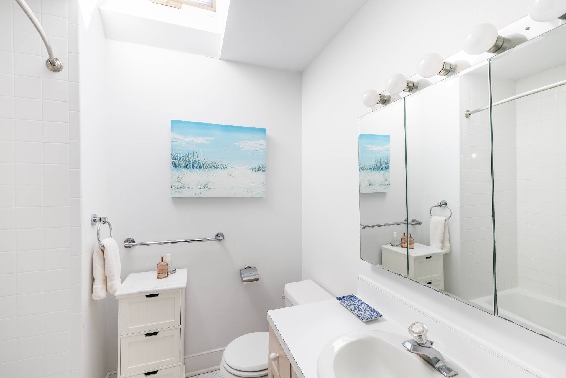 10 Aelfie's Way Bridgehampton, NY 11932 - Photo 20 of 23 a bathroom with a sink a toilet and shower