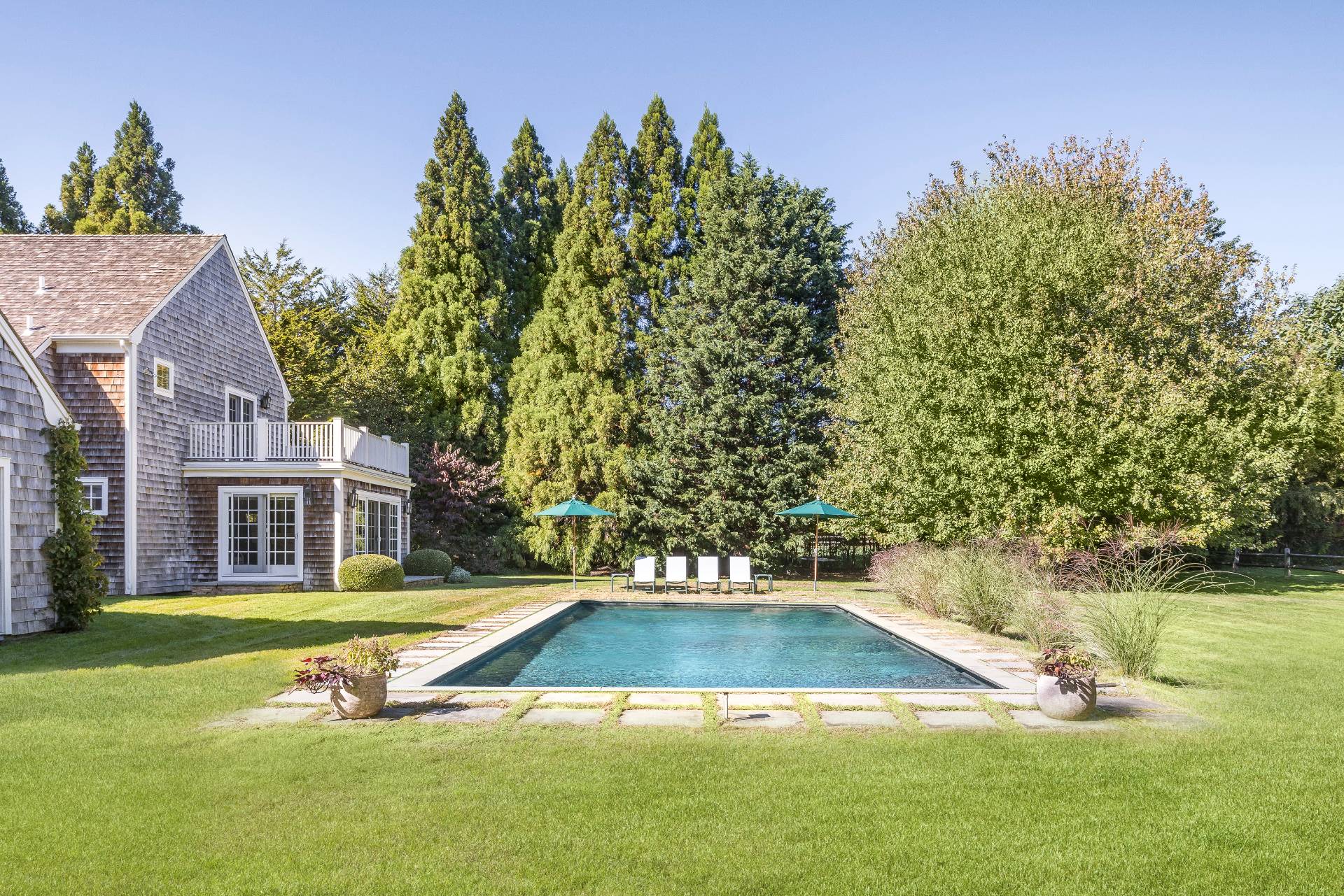 10 Aelfie's Way Bridgehampton, NY 11932 - Photo 2 of 23 a view of a house with swimming pool and yard