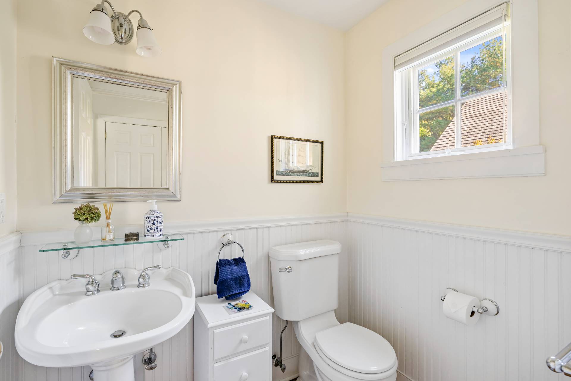 10 Aelfie's Way Bridgehampton, NY 11932 - Photo 22 of 23 a bathroom with a toilet a sink and mirror