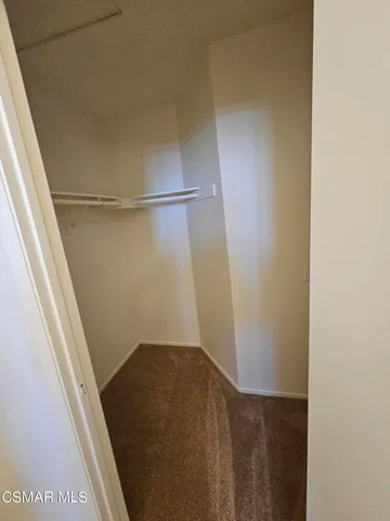 a view of an empty room with window