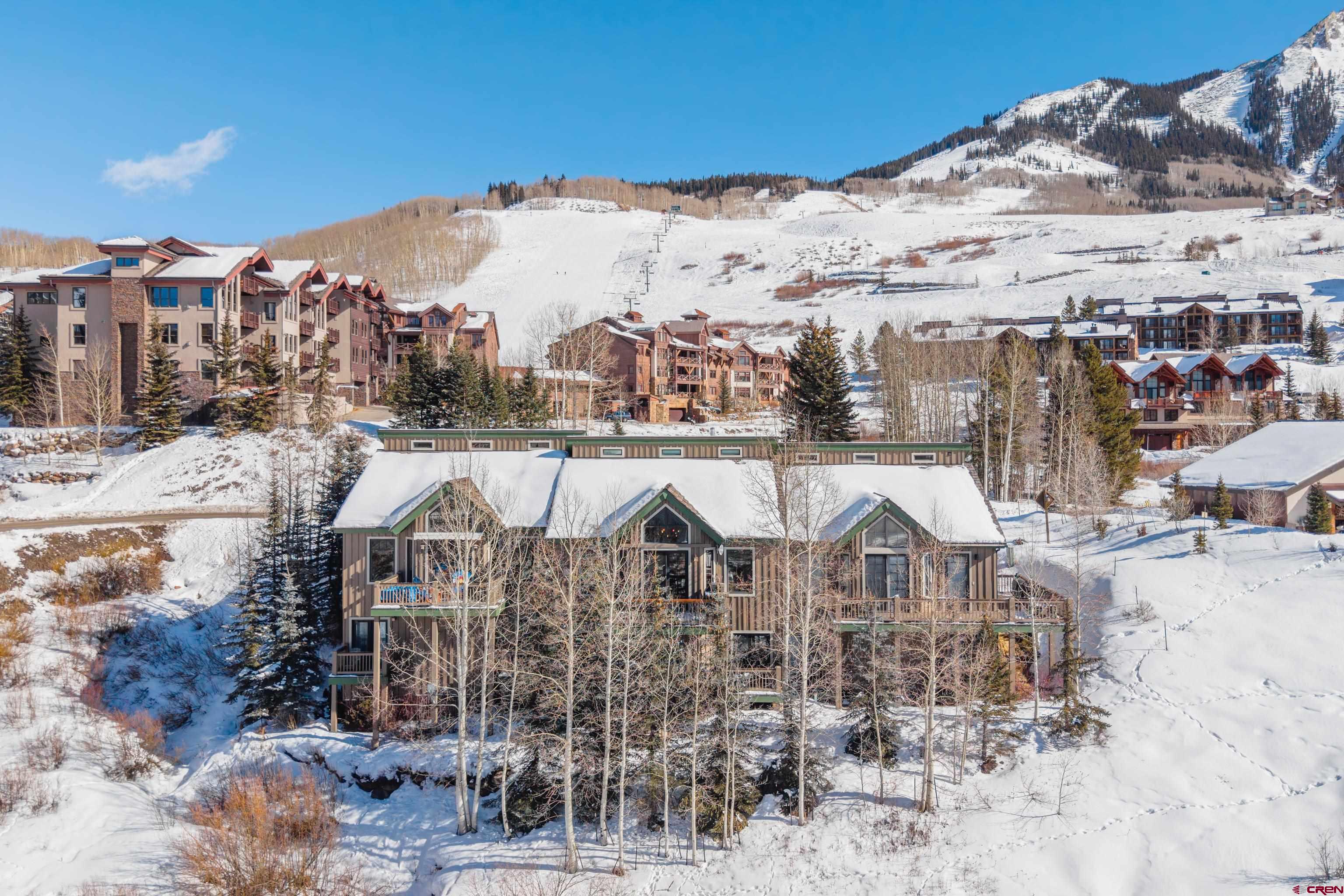 11 Castle Road Crested Butte, CO 81225 - Photo 28 of 45 a view of a city with tall buildings