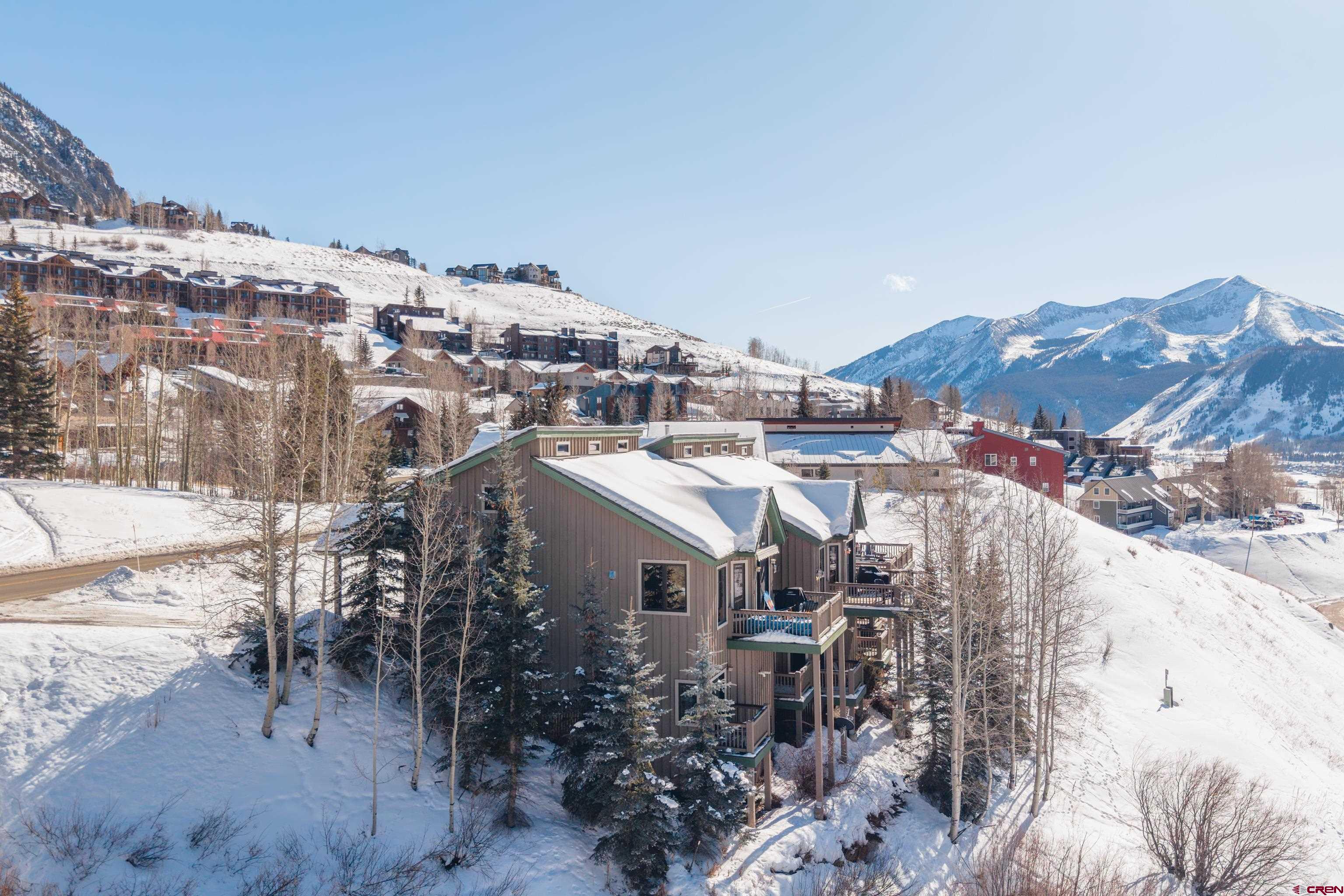 11 Castle Road Crested Butte, CO 81225 - Photo 30 of 45 a view of a house with a mountain