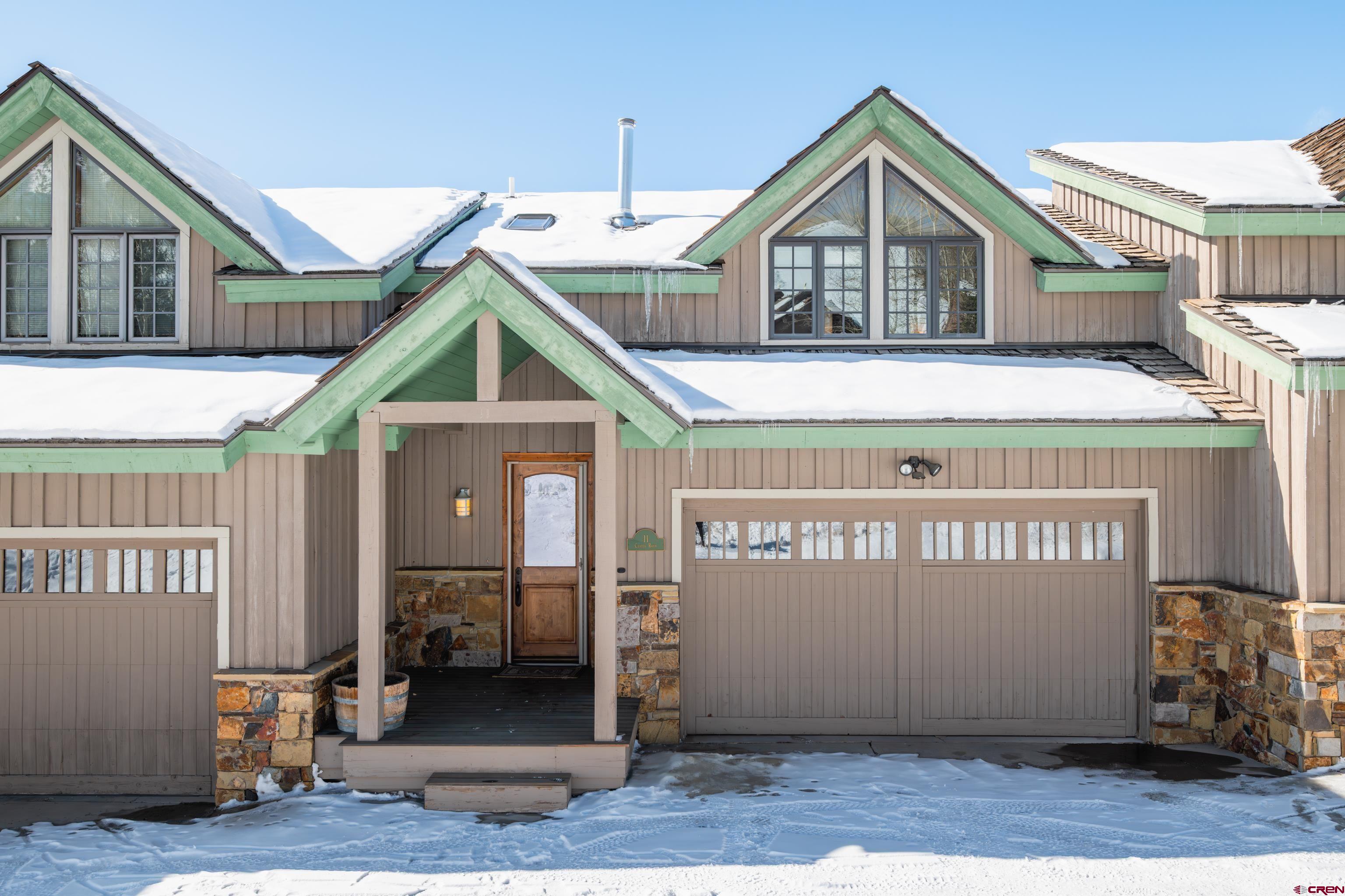 11 Castle Road Crested Butte, CO 81225 - Photo 45 of 45 a front view of a house with a garage