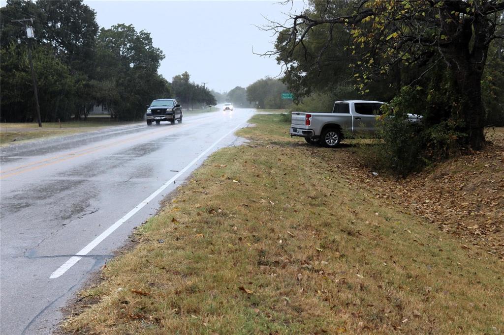 500 Main Street Quinlan, TX 75474 - Photo 2 of 5 a view of a backyard with sitting area