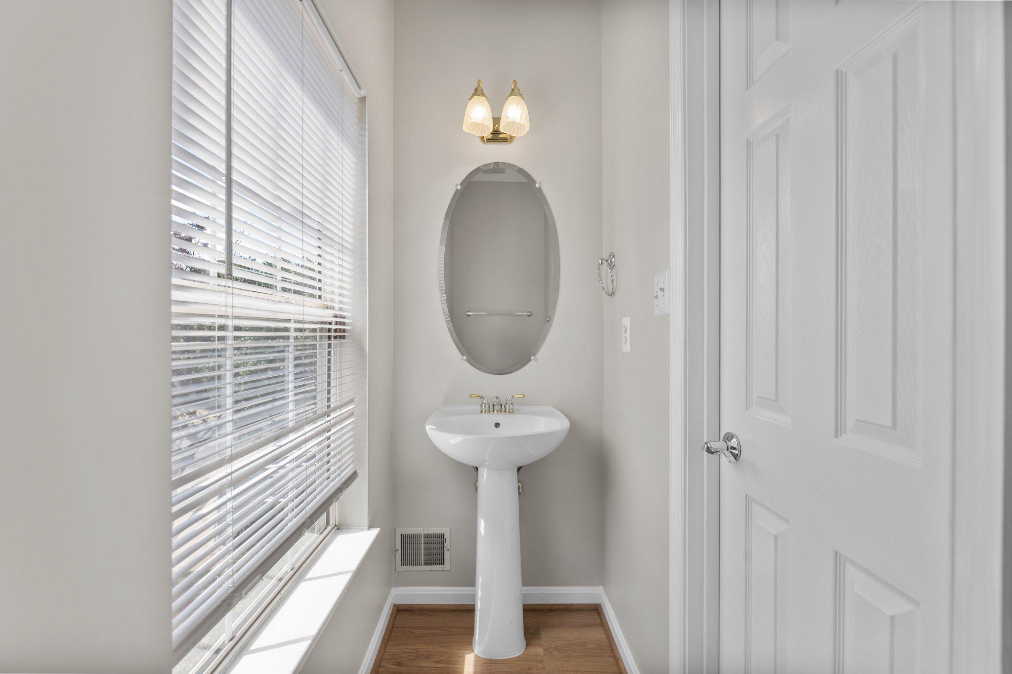 9241 Lorton Valley Road Lorton, VA 22079 - Photo 18 of 45 Half-bath with new luxury vinyl plank flooring.