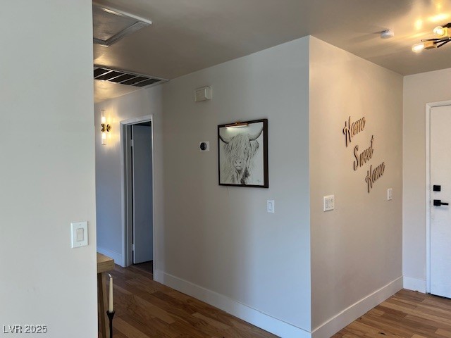 2712 Rialto Road Las Vegas, NV 89108 - Photo 53 of 54 Hall featuring wood finished floors and attic access
