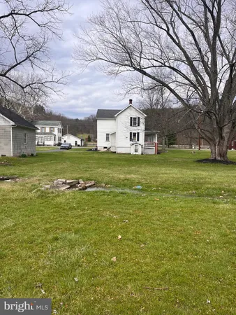 a house view with a outdoor space