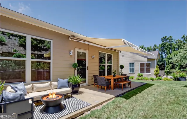 front view of a house with a yard