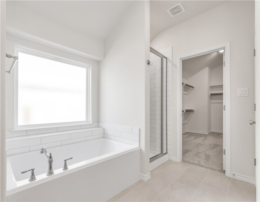 1931 Pinemont View Drive Bryan, TX 77807 - Photo 27 of 43 a bathroom with a bathtub and a sink