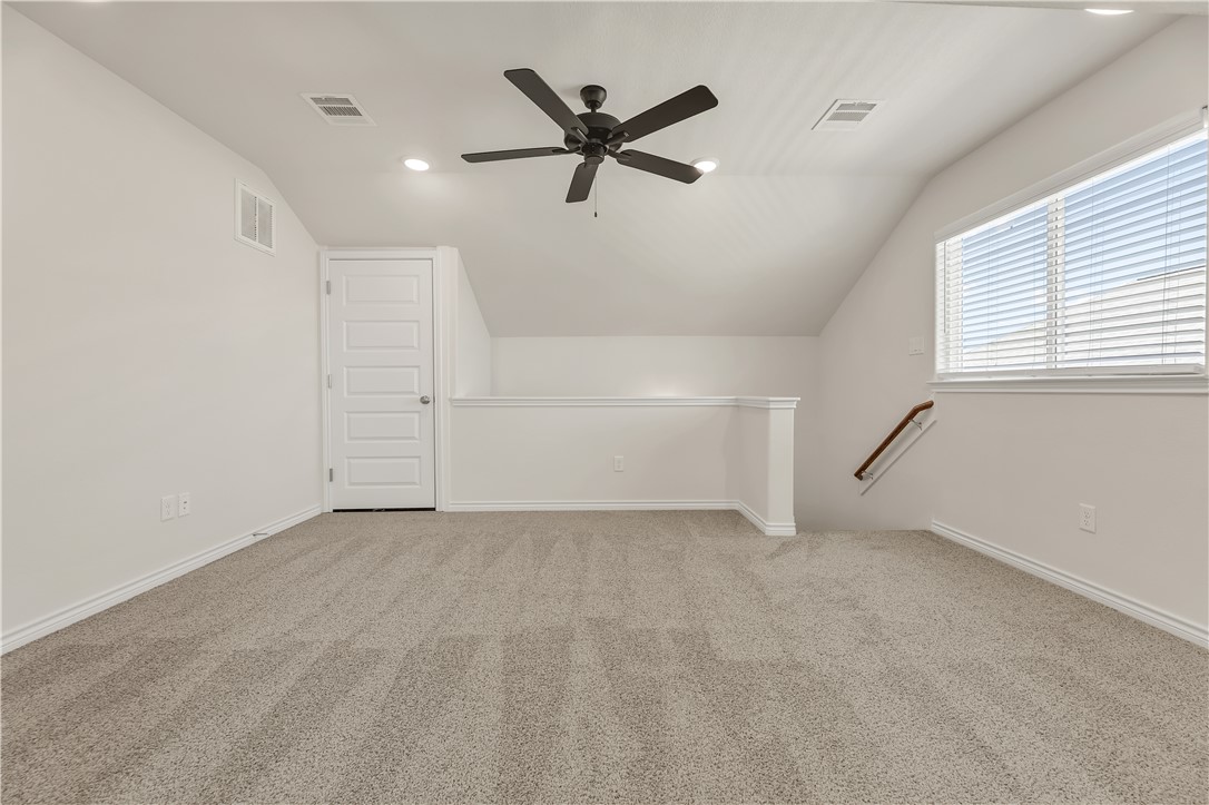 1931 Pinemont View Drive Bryan, TX 77807 - Photo 34 of 43 an empty room with closet and windows