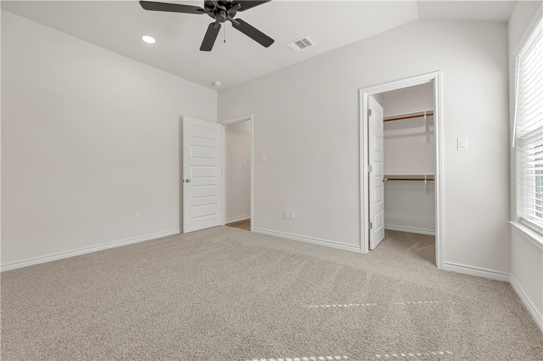 1931 Pinemont View Drive Bryan, TX 77807 - Photo 40 of 43 a view of an empty room with a window