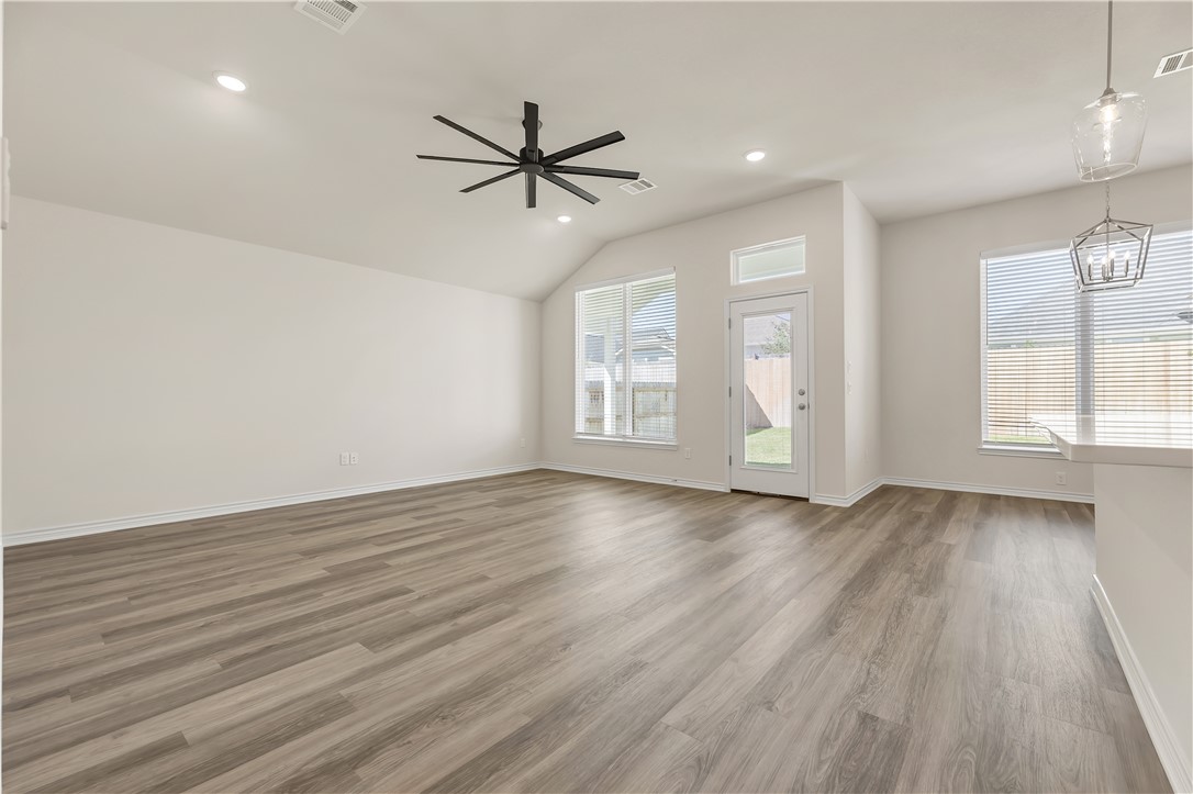 1931 Pinemont View Drive Bryan, TX 77807 - Photo 5 of 43 a view of empty room with wooden floor and window