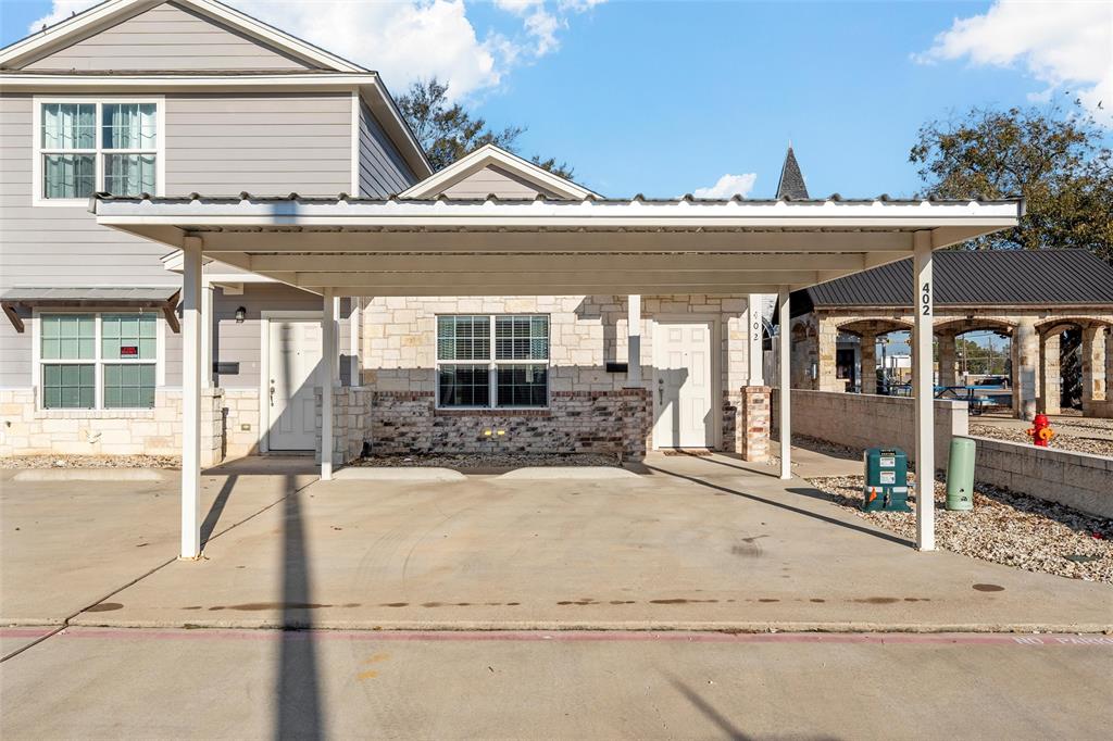 402 Spring Street McGregor, TX 76657 - Photo 2 of 16 front view of a house with a view of a house