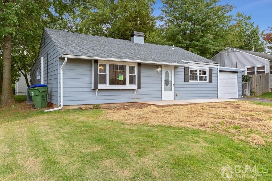 32 Winthrop Road Edison, NJ 08817 - Photo 15 of 15 a front view of a house with a garden