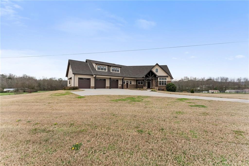 725 County Farm Road Jefferson, GA 30549 - Photo 2 of 66 a house view with a outdoor space