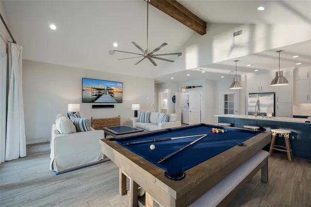a living room with furniture and a table