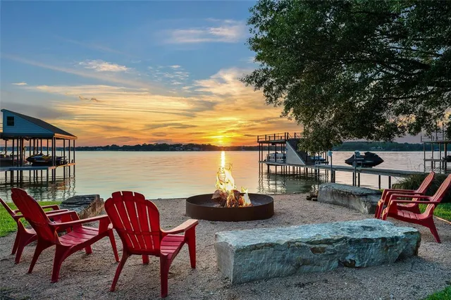 a view of a chairs and table in the patio
