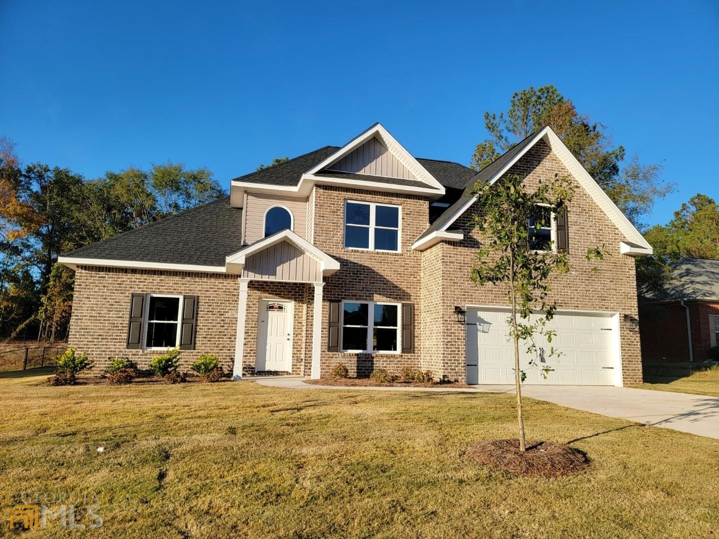 141 Timber Ridge Boulevard Byron, GA 31008 - Photo 1 of 1 a front view of a house with yard
