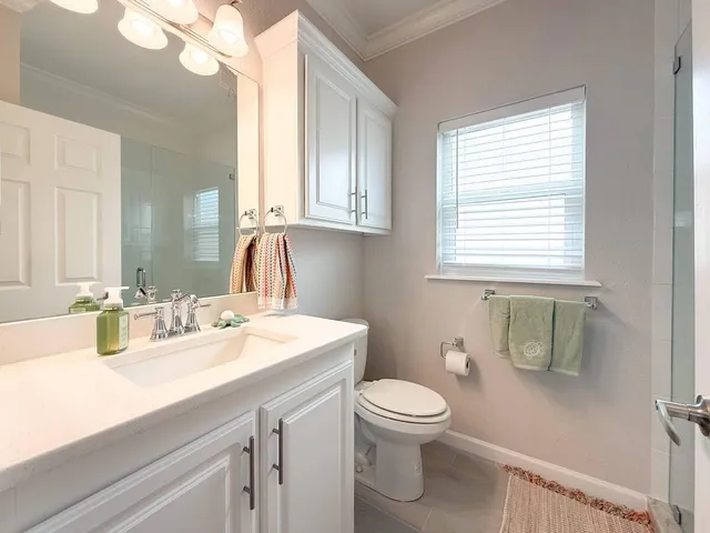 a vase of flowers sitting on a table