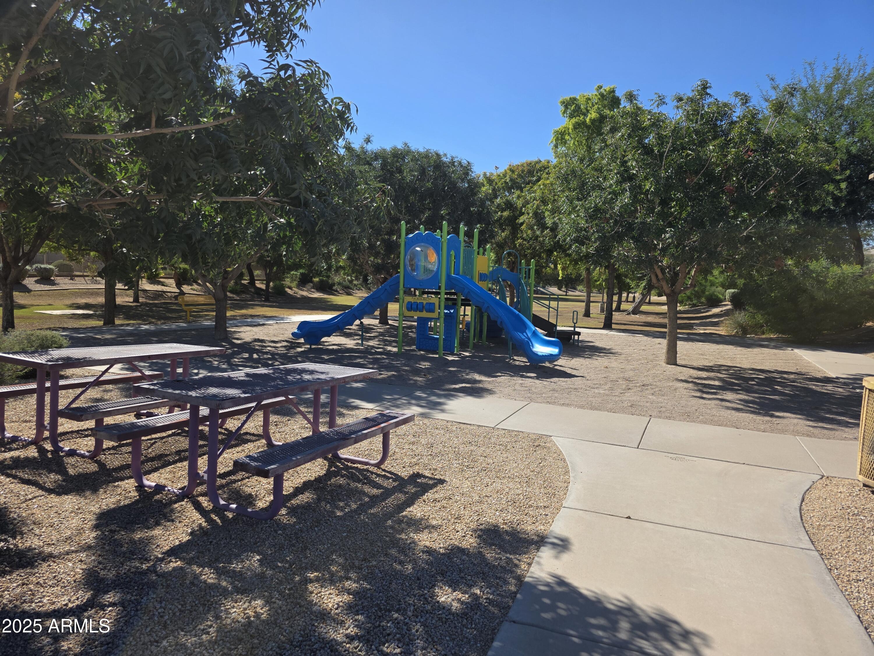 1162 East Springfield Place Chandler, AZ 85286 - Photo 25 of 27 a view of a park with swings and slides