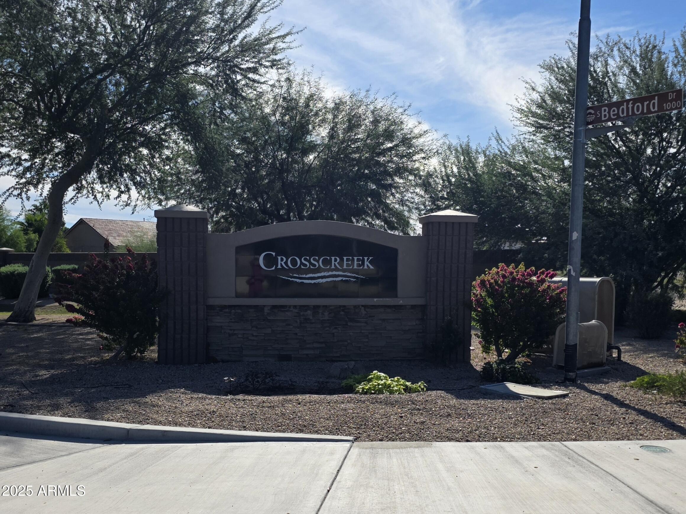 1162 East Springfield Place Chandler, AZ 85286 - Photo 27 of 27 a view of a street sign under an umbrella