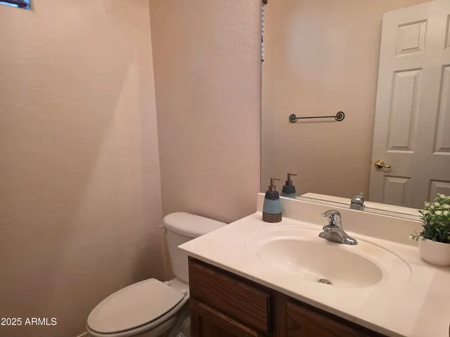 a bathroom with a sink a toilet