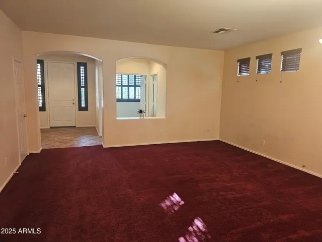 a view of livingroom and hardwood floor
