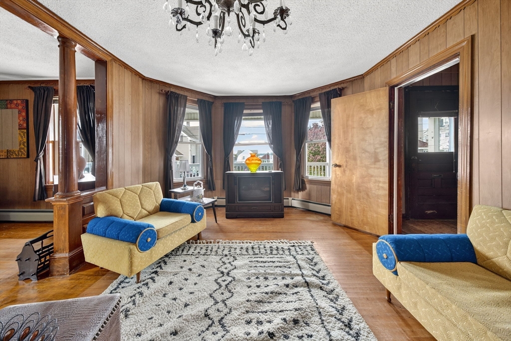 484 South Beach Street Fall River, MA 02724 - Photo 15 of 25 a bedroom with furniture and large windows