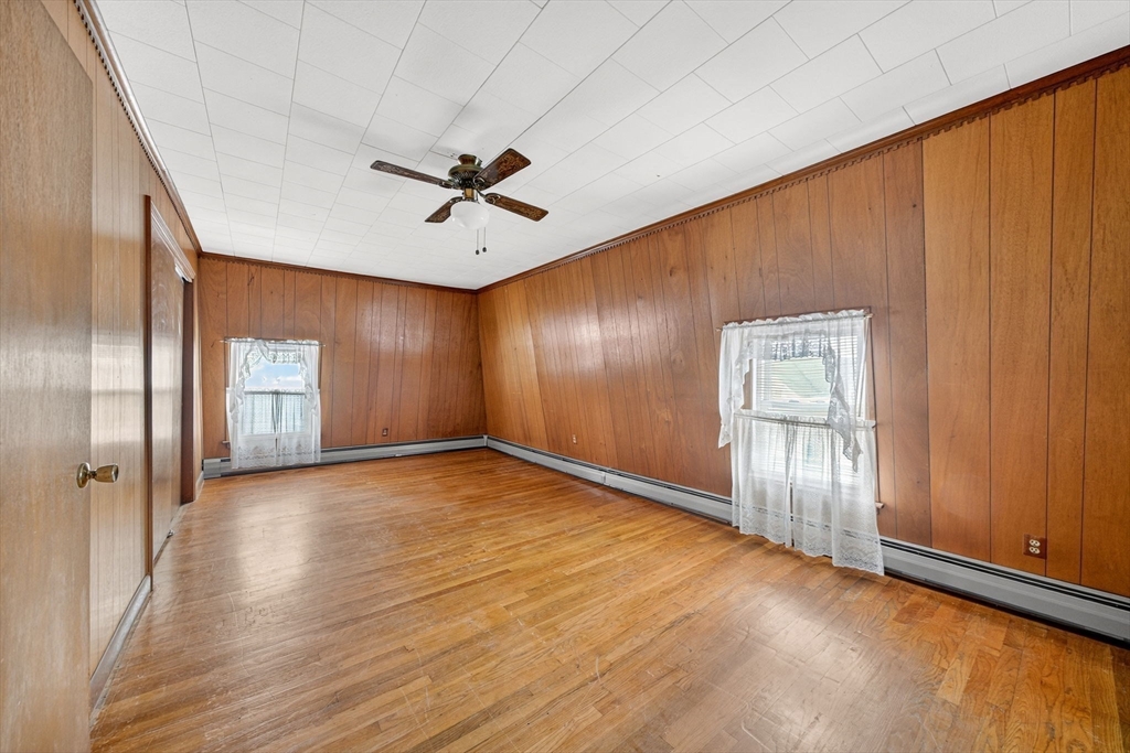 484 South Beach Street Fall River, MA 02724 - Photo 22 of 25 a view of empty room with wooden floor and fan