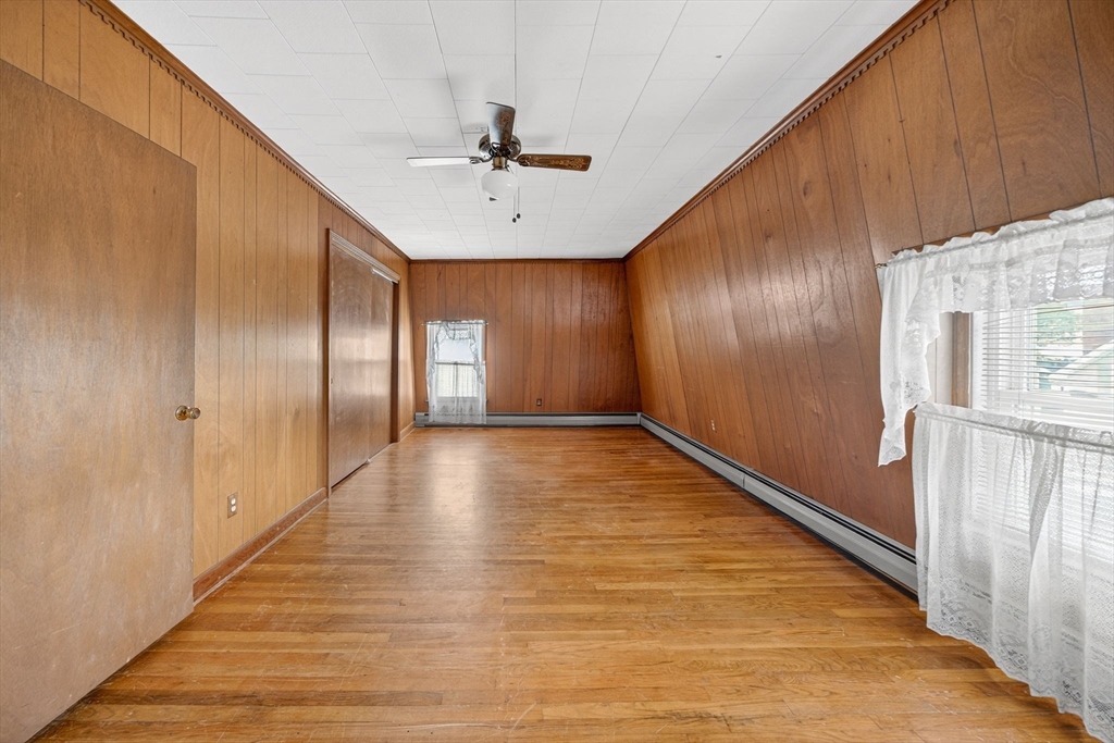 484 South Beach Street Fall River, MA 02724 - Photo 23 of 25 a view of a hallway with wooden floor