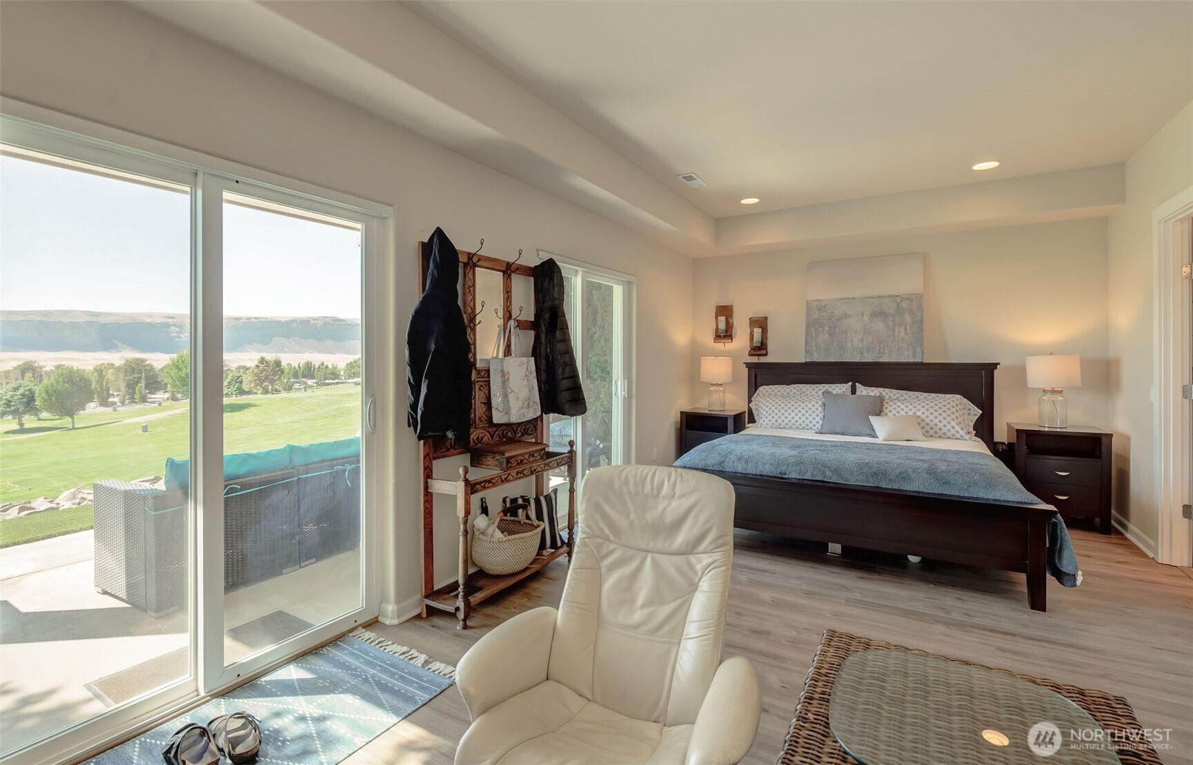 23318 Sunserra Loop, Unit B00 Quincy, WA 98848 - Photo 15 of 30 a bedroom with a bed and large window