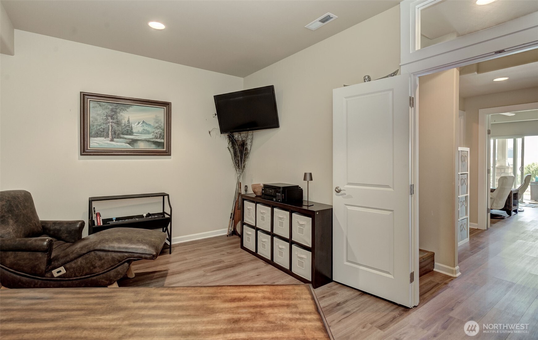 23318 Sunserra Loop, Unit B00 Quincy, WA 98848 - Photo 21 of 30 a bedroom with furniture and a flat screen tv