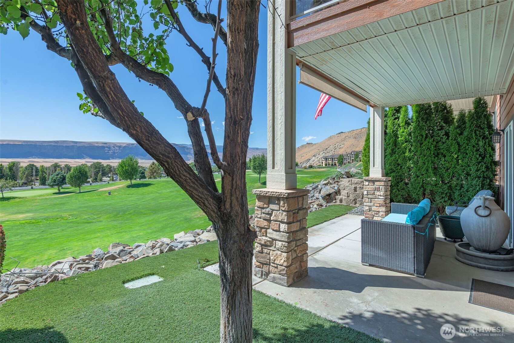 23318 Sunserra Loop, Unit B00 Quincy, WA 98848 - Photo 28 of 30 a front view of a house with garden