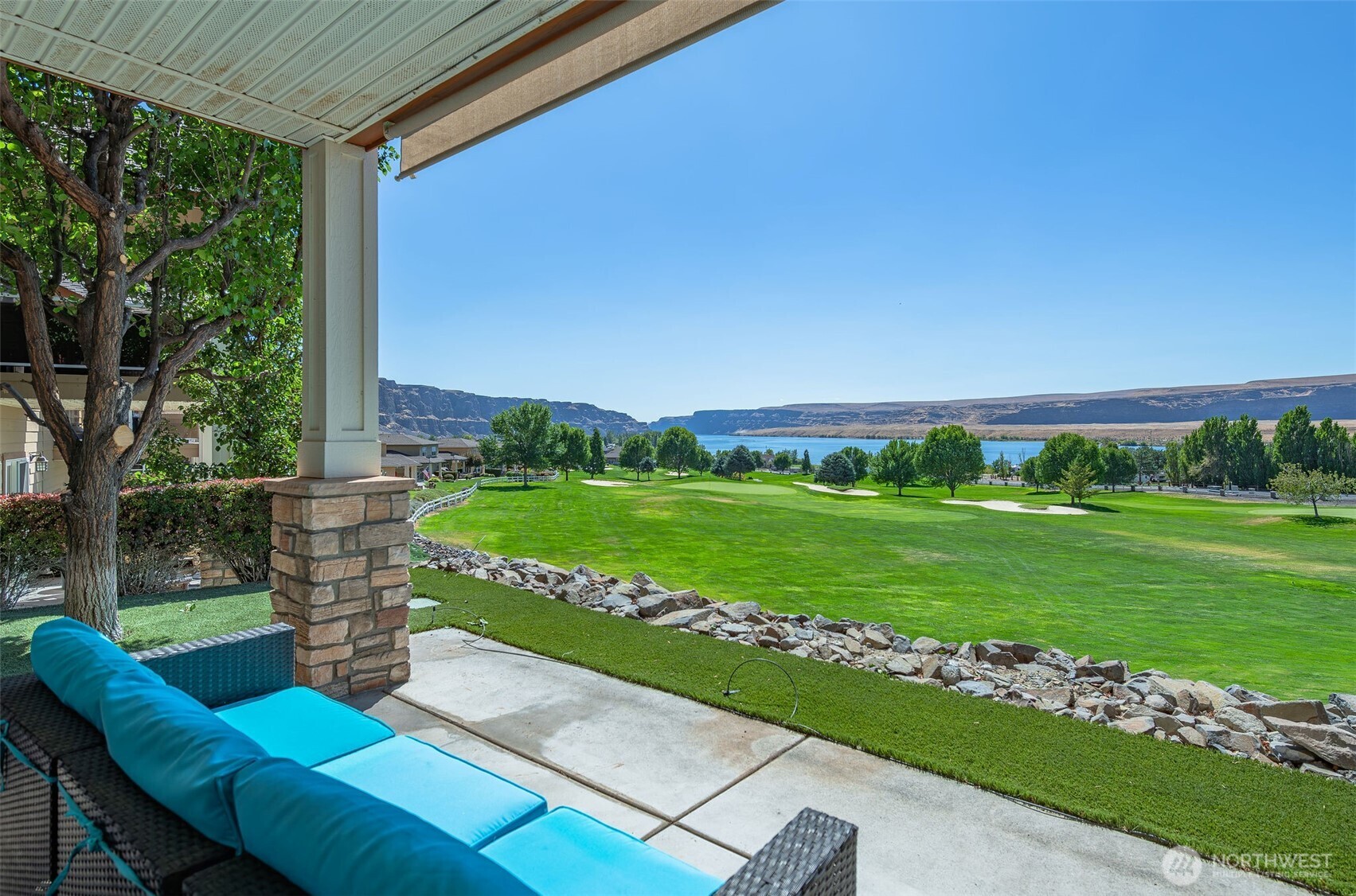 23318 Sunserra Loop, Unit B00 Quincy, WA 98848 - Photo 4 of 30 a view of a chair and table in the garden