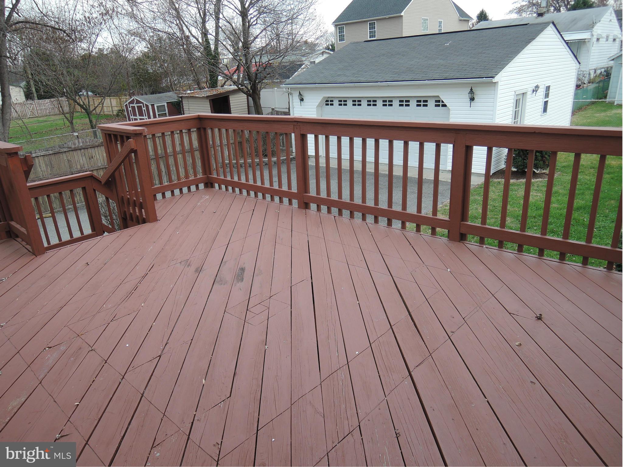 229 Arundel Road Pasadena, MD 21122 - Photo 19 of 23 Large deck leading to rear yard