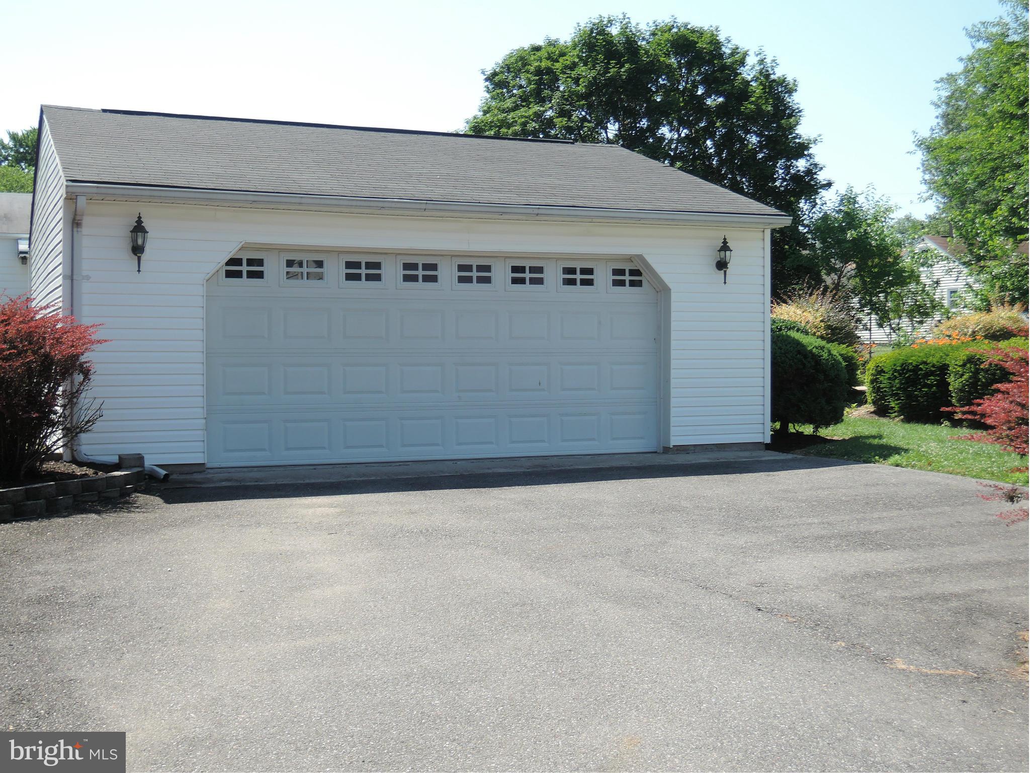 229 Arundel Road Pasadena, MD 21122 - Photo 21 of 23 2 car garage w/shelving for plenty of storage