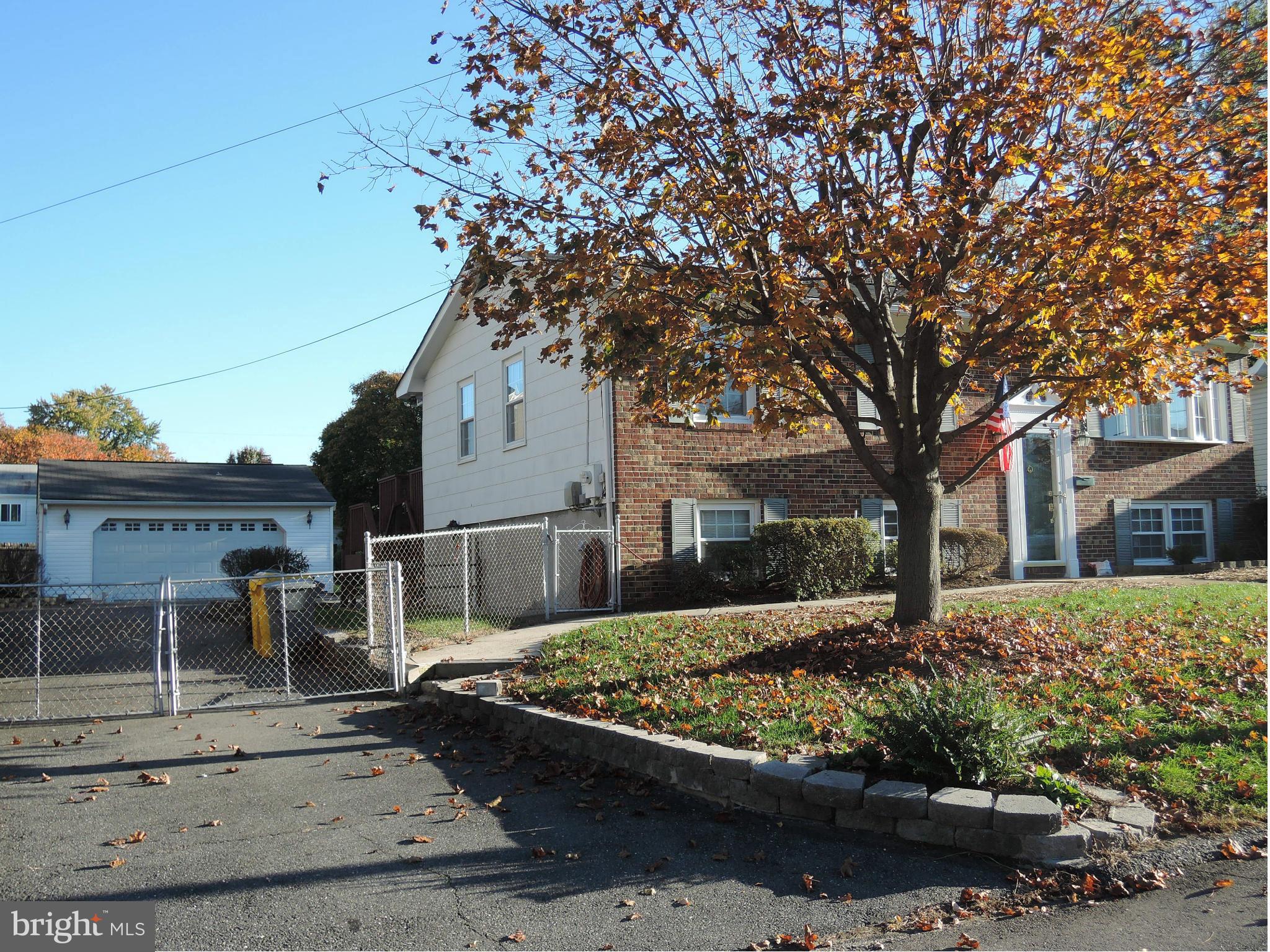 229 Arundel Road Pasadena, MD 21122 - Photo 4 of 23 Gated drive w/lots of parking area to 2 car garage