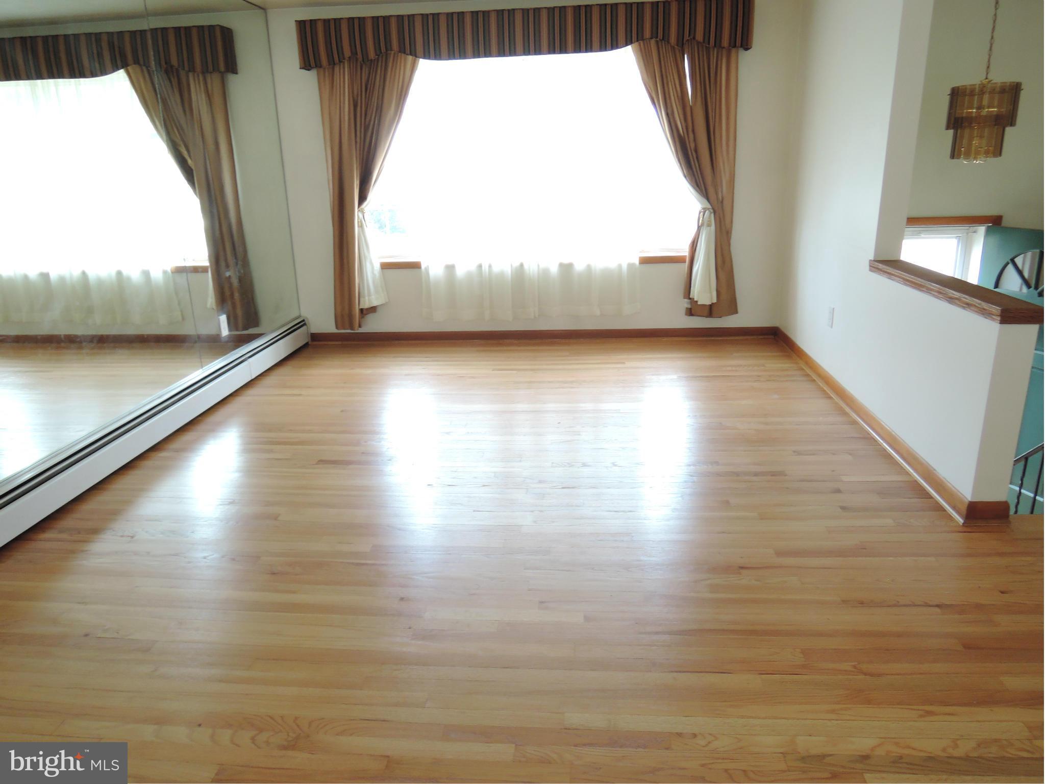 229 Arundel Road Pasadena, MD 21122 - Photo 7 of 23 Living Room with gleaming hardwood floors