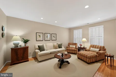 a view of a dining room with furniture and window
