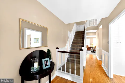 a view of a balcony wooden floor and staircase