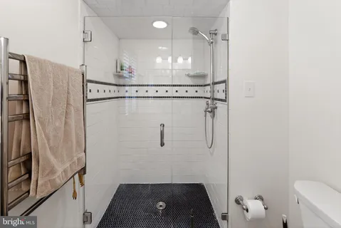 a bathroom with a sink and a window